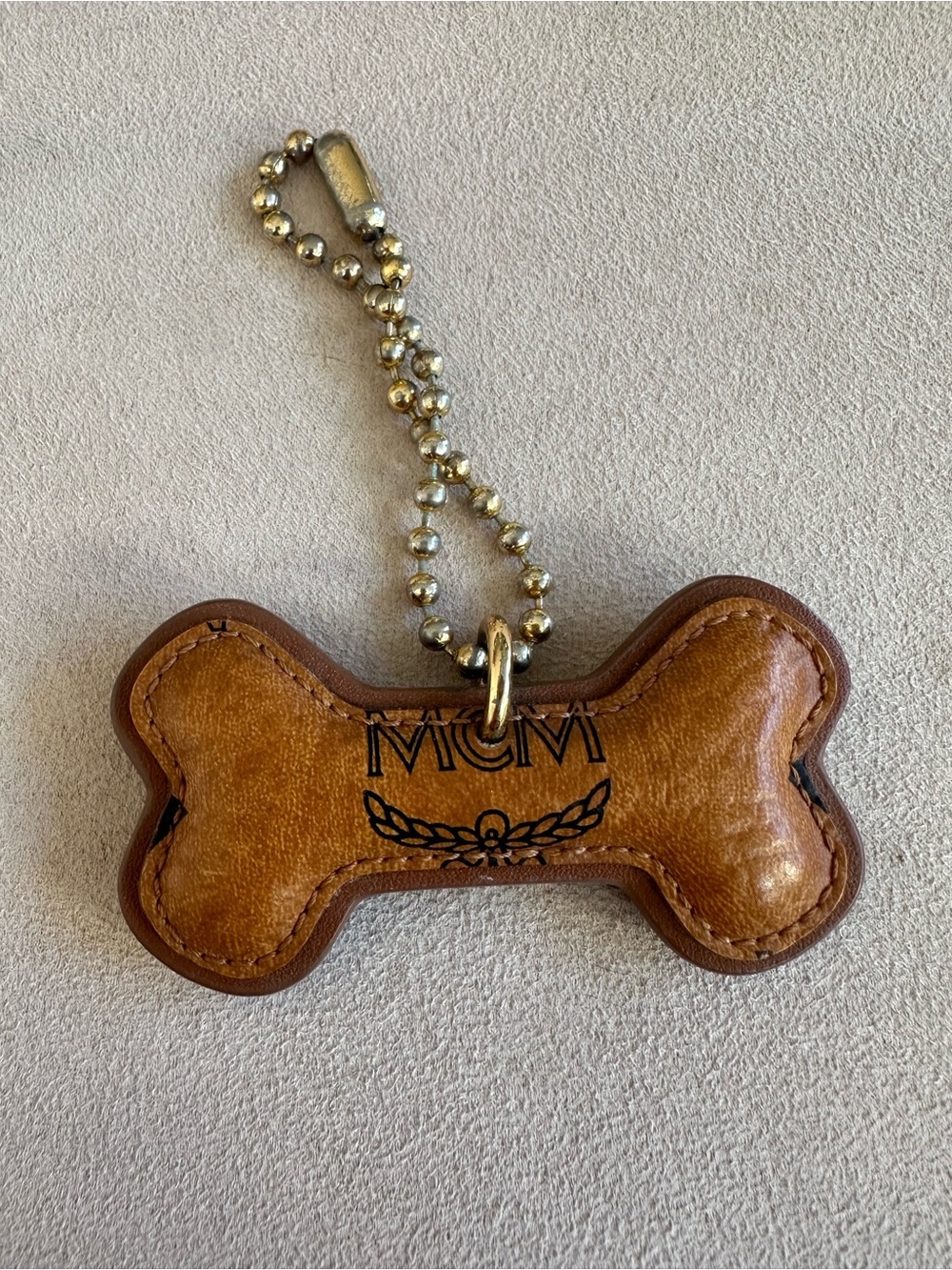 MCM Cognac Leather Visetos Monogram Dog Bone Bag Charm – Authentic
